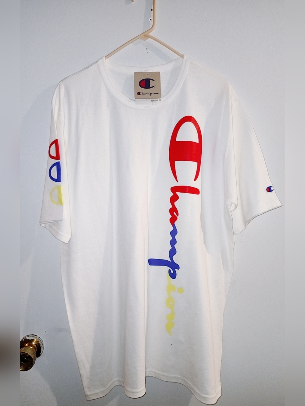 Champion White Logo Vertical Script Tee with Red/Blue/Yellow Print